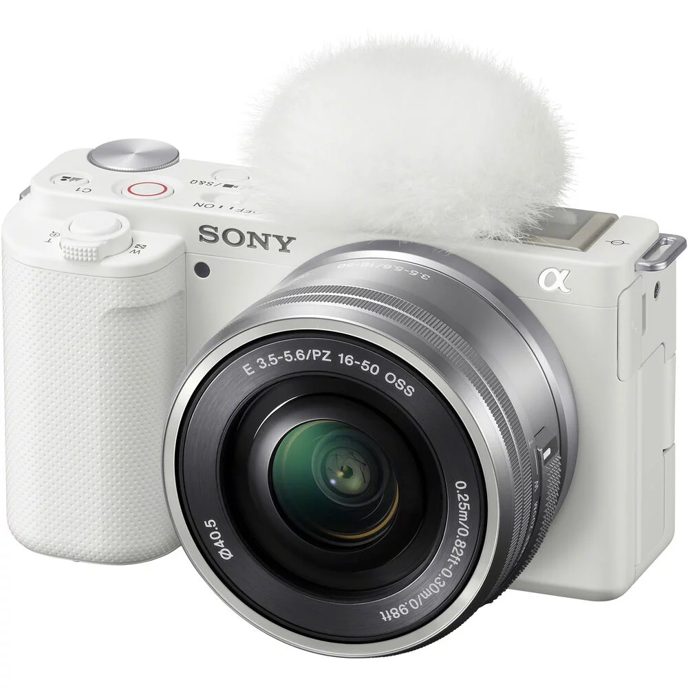 Sony ZV-E10 Mirrorless Camera with 16-50mm Lens (White) (ILCZV-E10L/W) + 64GB Memory Card + Card Reader + Case + Flex Tripod + Memory Wallet + Cap Keeper + Cleaning Kit