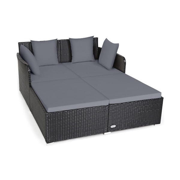 Spacious Outdoor Rattan Daybed with Upholstered Cushions and Pillows