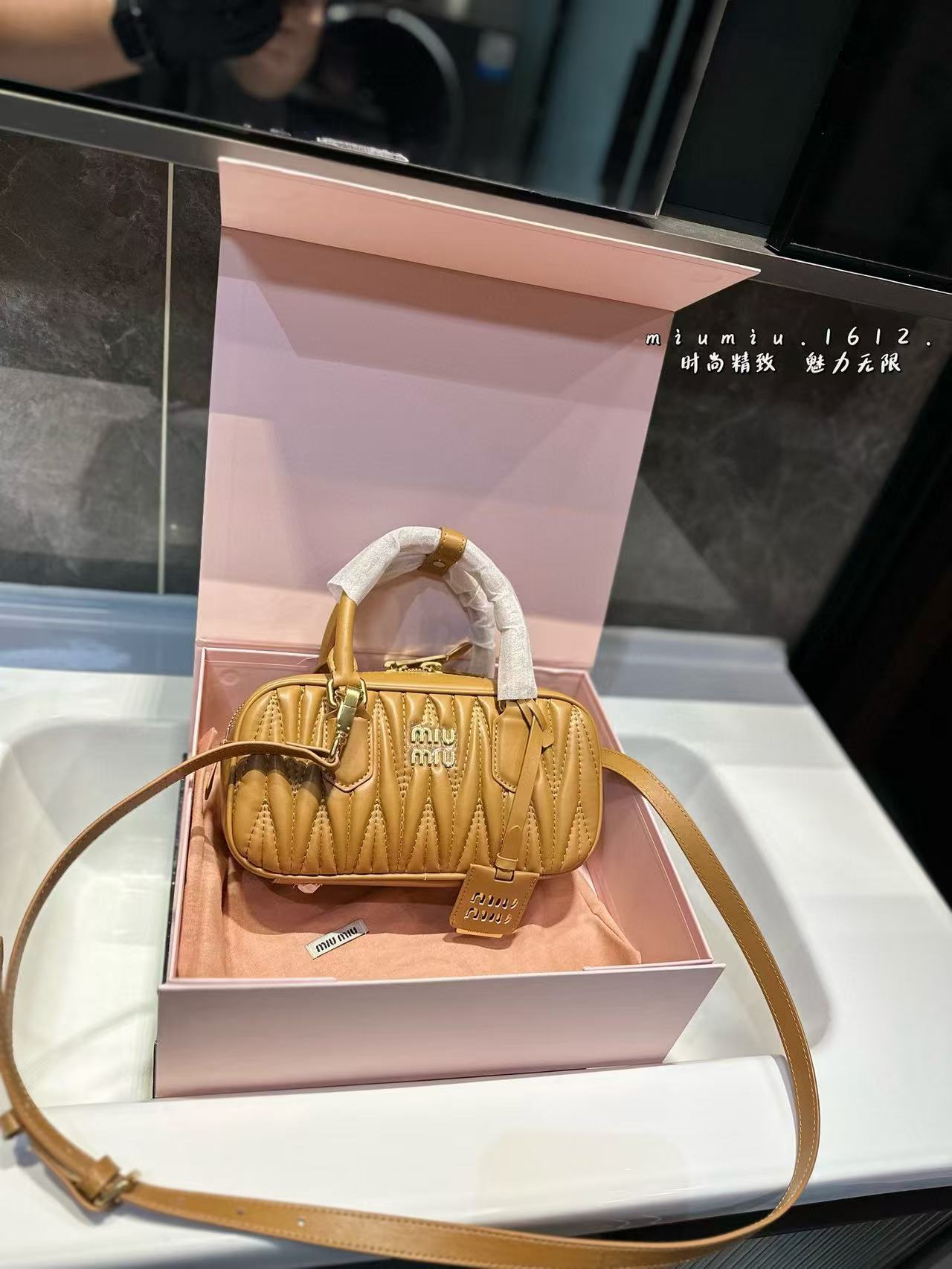 Miumiu Aracdie pleated bowling bag - cnluxepick