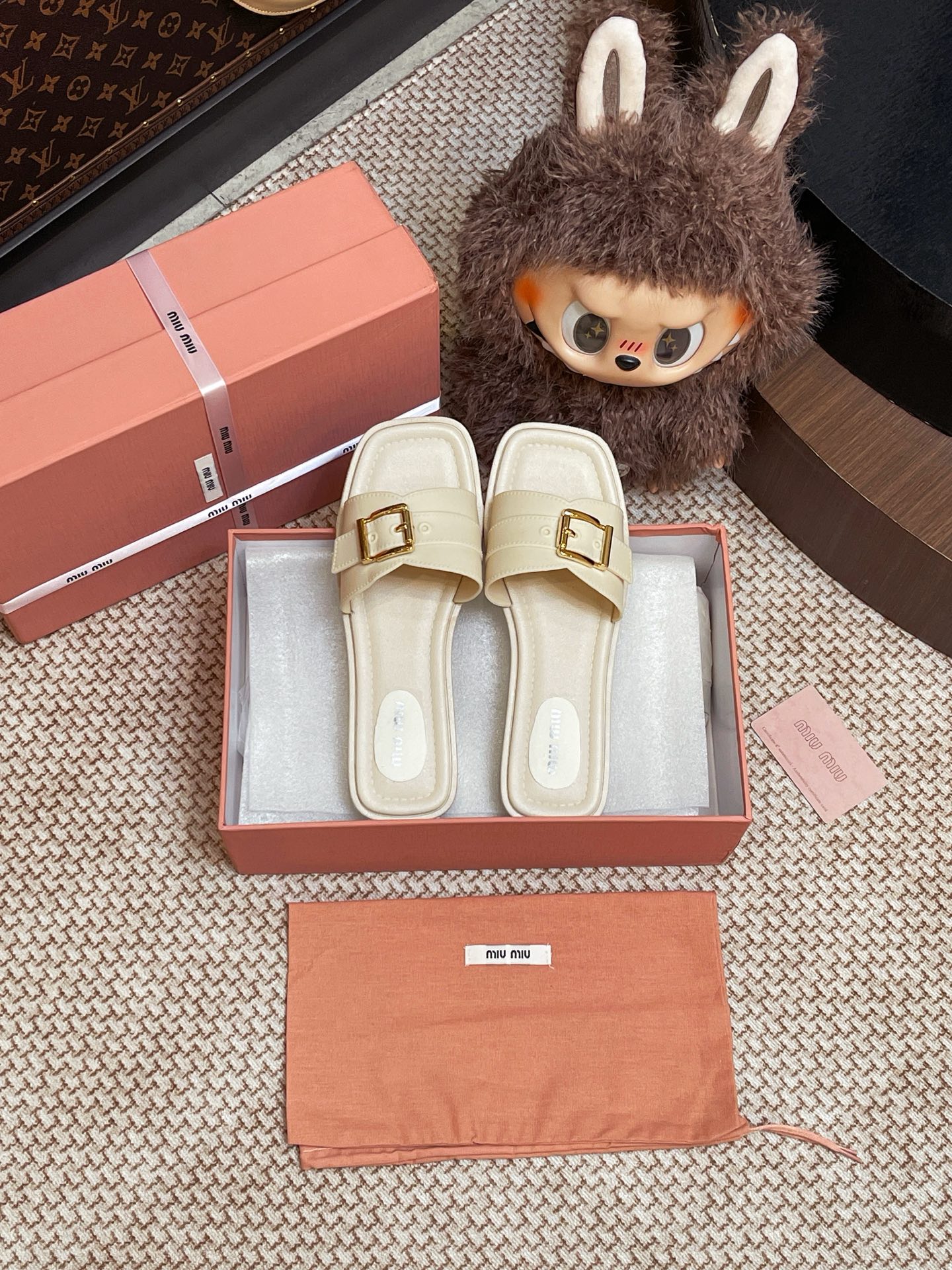 Miumiu metal buckle slippers - cnluxepick