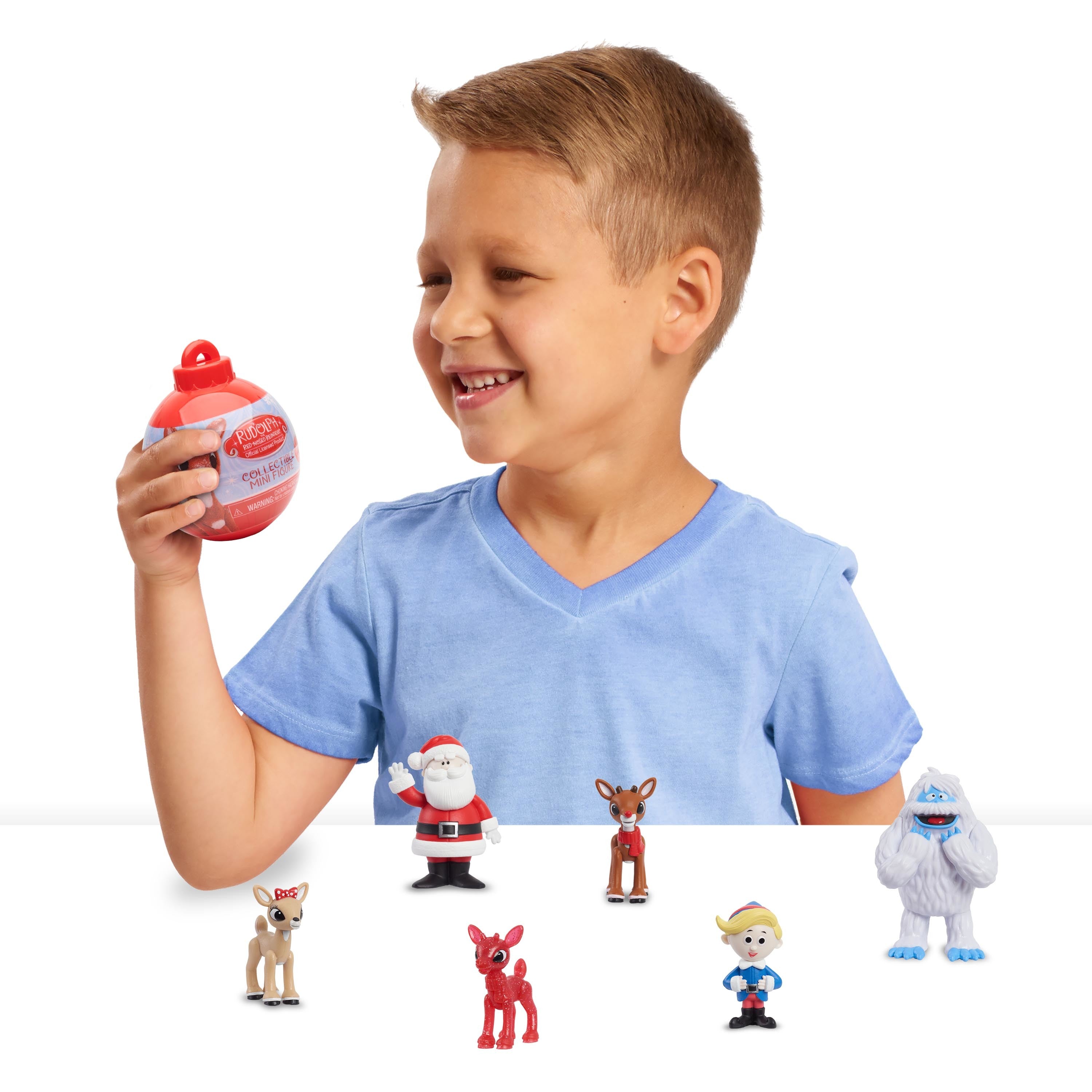 Rudolph the Red-Nosed Reindeer Mini Figure Holiday Capsule Ornaments and Stocking Stuffers,  Kids Toys for Ages 3 Up, Gifts and Presents