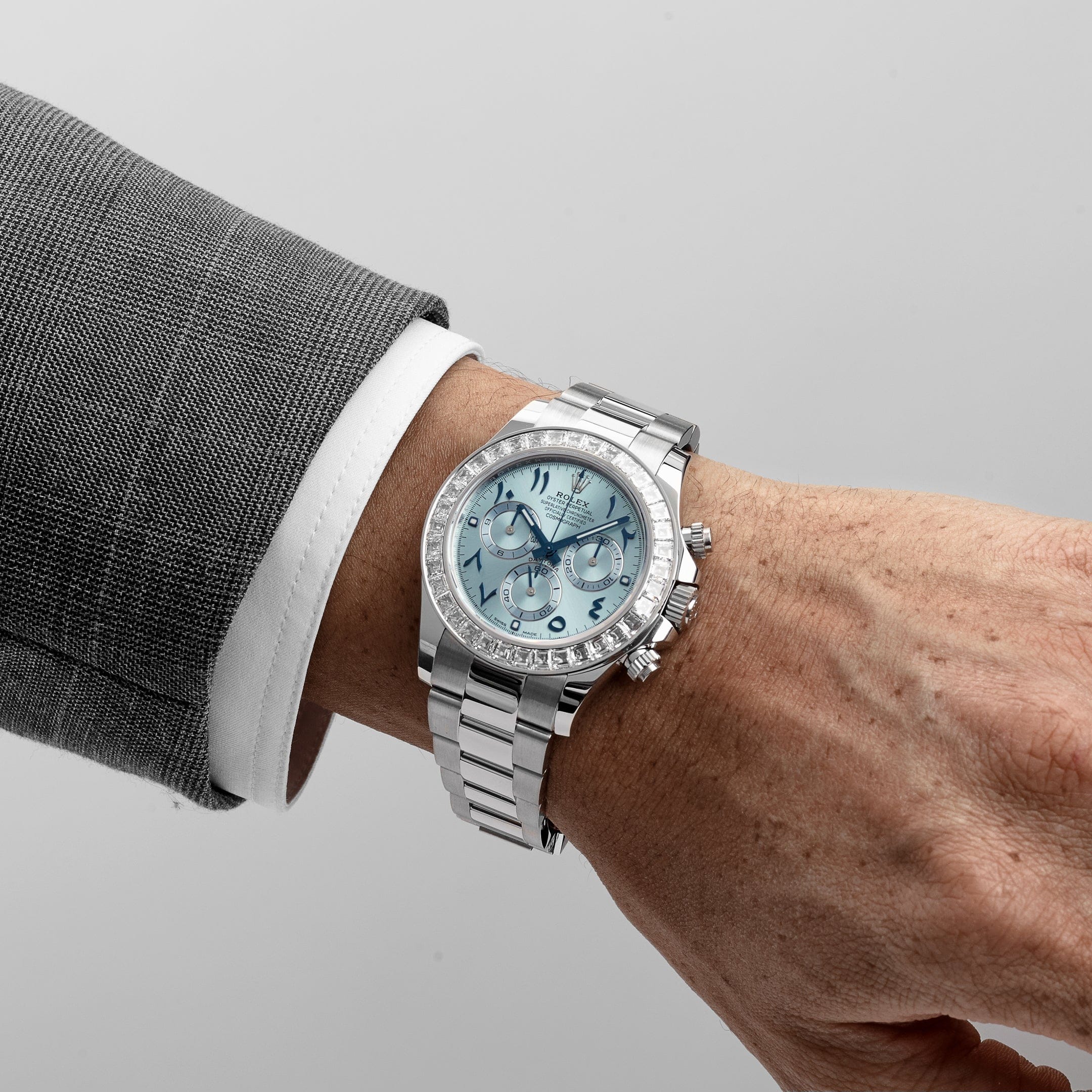 Rolex Daytona 116576TBR Platinum Ice Blue Arabic Dial Diamond Baguette Bezel