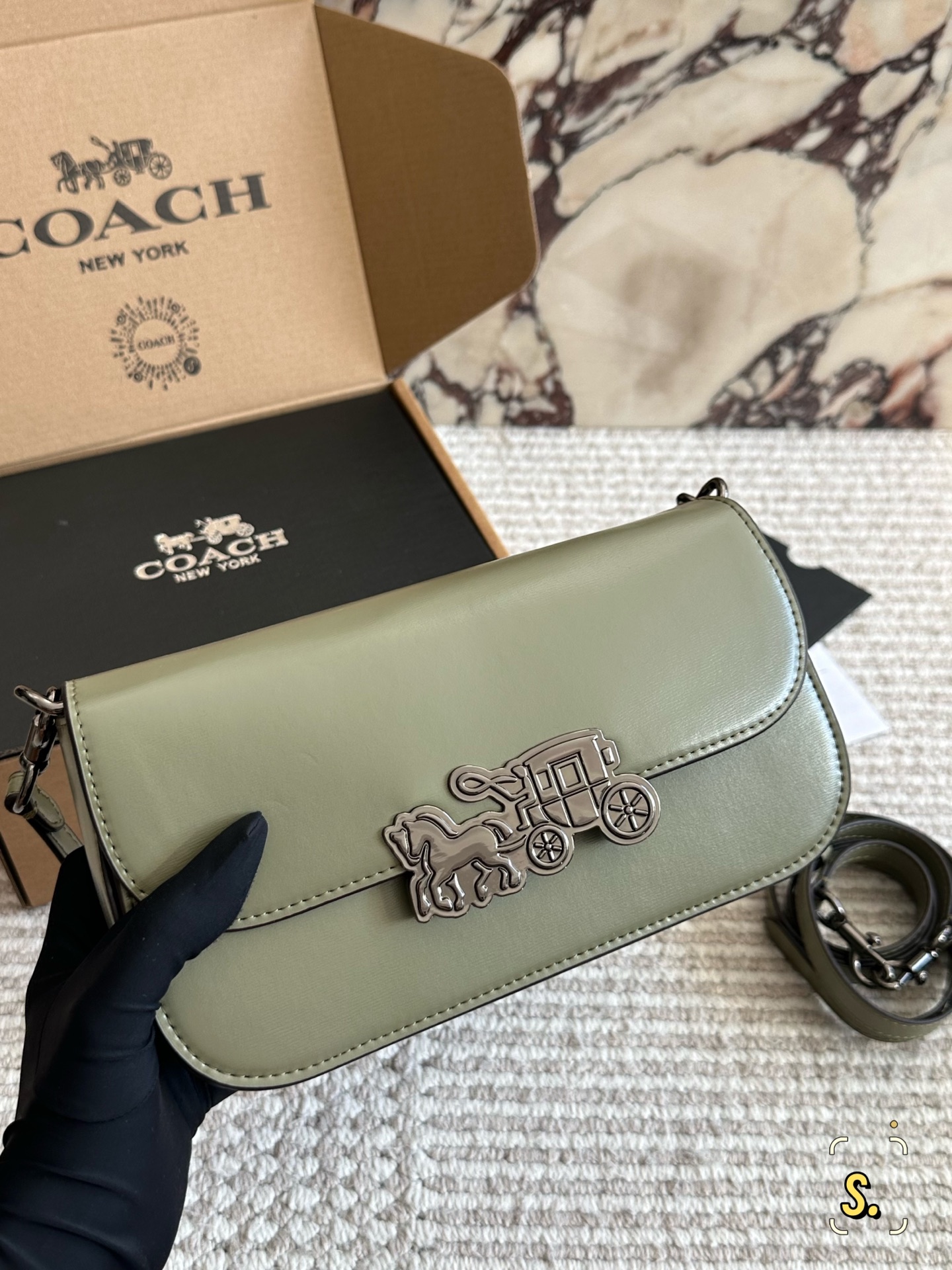 Coach's new small square bag - cnluxepick