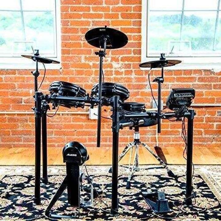 alesis-drums-nitro-mesh-kit-Eight Piece All Mesh Electronic Drum Kit With Super Solid Aluminum Rack, 385 Sounds, 60 Play Along Tracks, Connection Cables, Drum Sticks & Drum Key Included