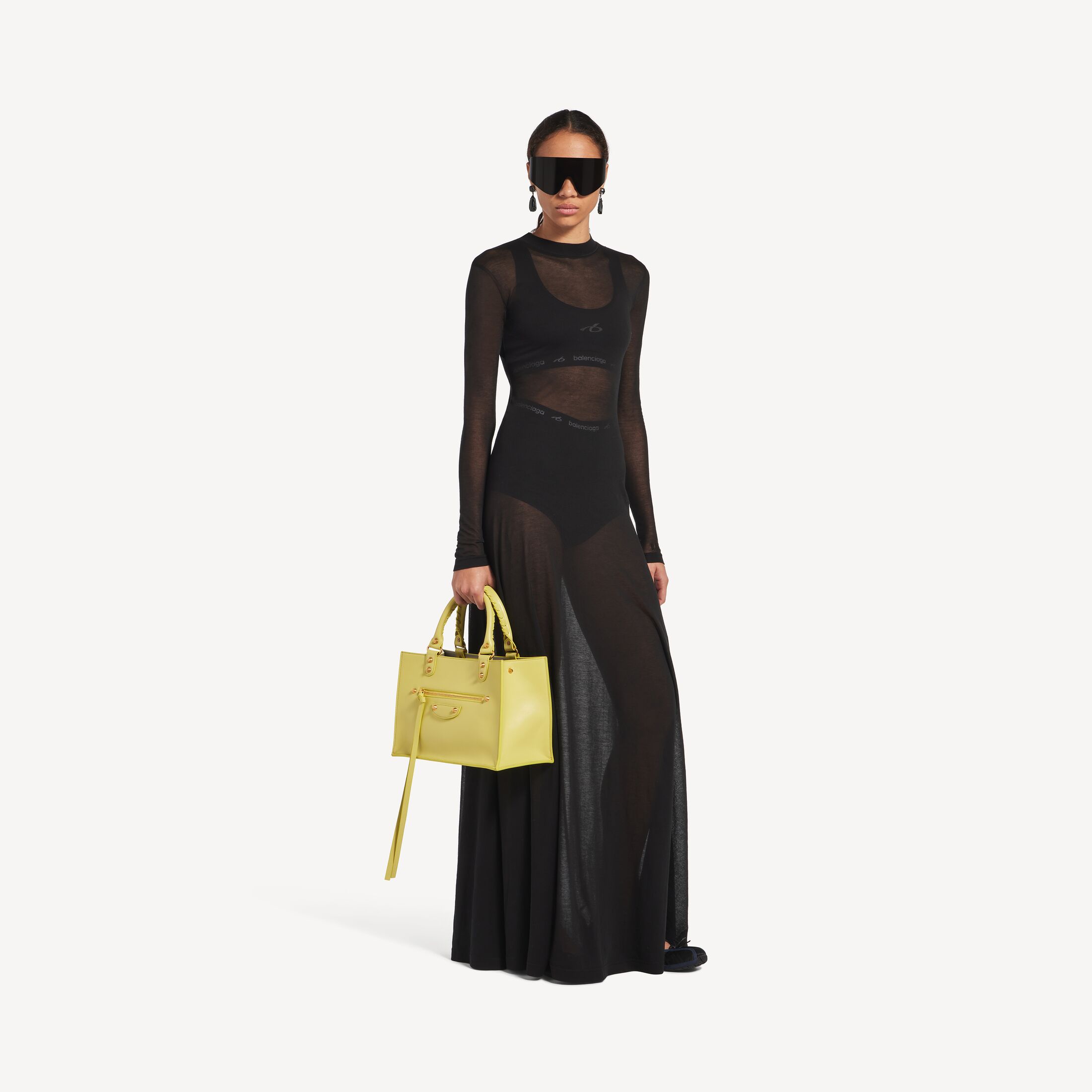 BALENCIAGA WOMEN'S TECHWEAR BRA TANK TOP IN BLACK Techwear Bra Tank Top in black technical fabric is from the looks 14 and 15 of Balenciaga's Fall 26 Collection.