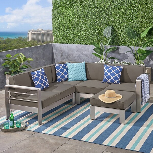 Cape Coral Outdoor 5Seater VShape Aluminum Sectional Sofa Set with Ottoman by Christopher Knight Home