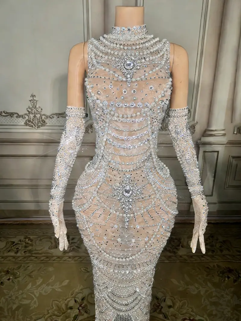 White Beaded Mermaid Gown – High-Neck Sleeveless Design with Dramatic Open Back & Floor-Sweeping Hem