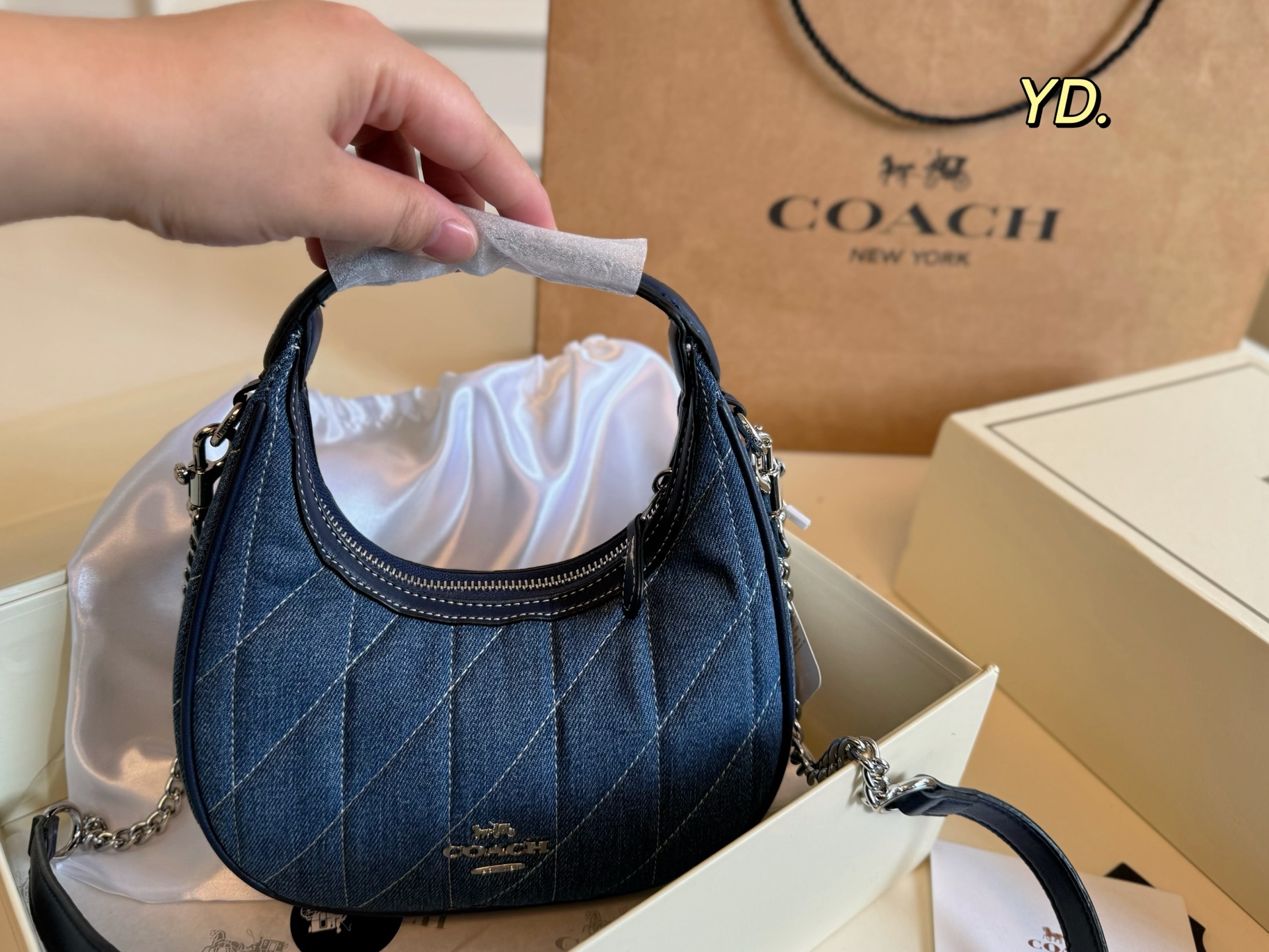 Coach's new Carmen mini crescent armpit bag - cnluxepick