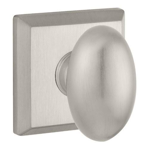 Ellipse Passage Door Knob with Traditional Square Rose Baldwin Finish: Matte Brass u0026 Black