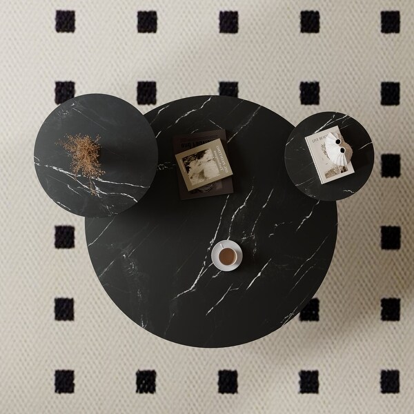 Modern coffee table with two display shelves,Black Faux marble surfaces,Tripodinspired base and Rounded tabletop edges