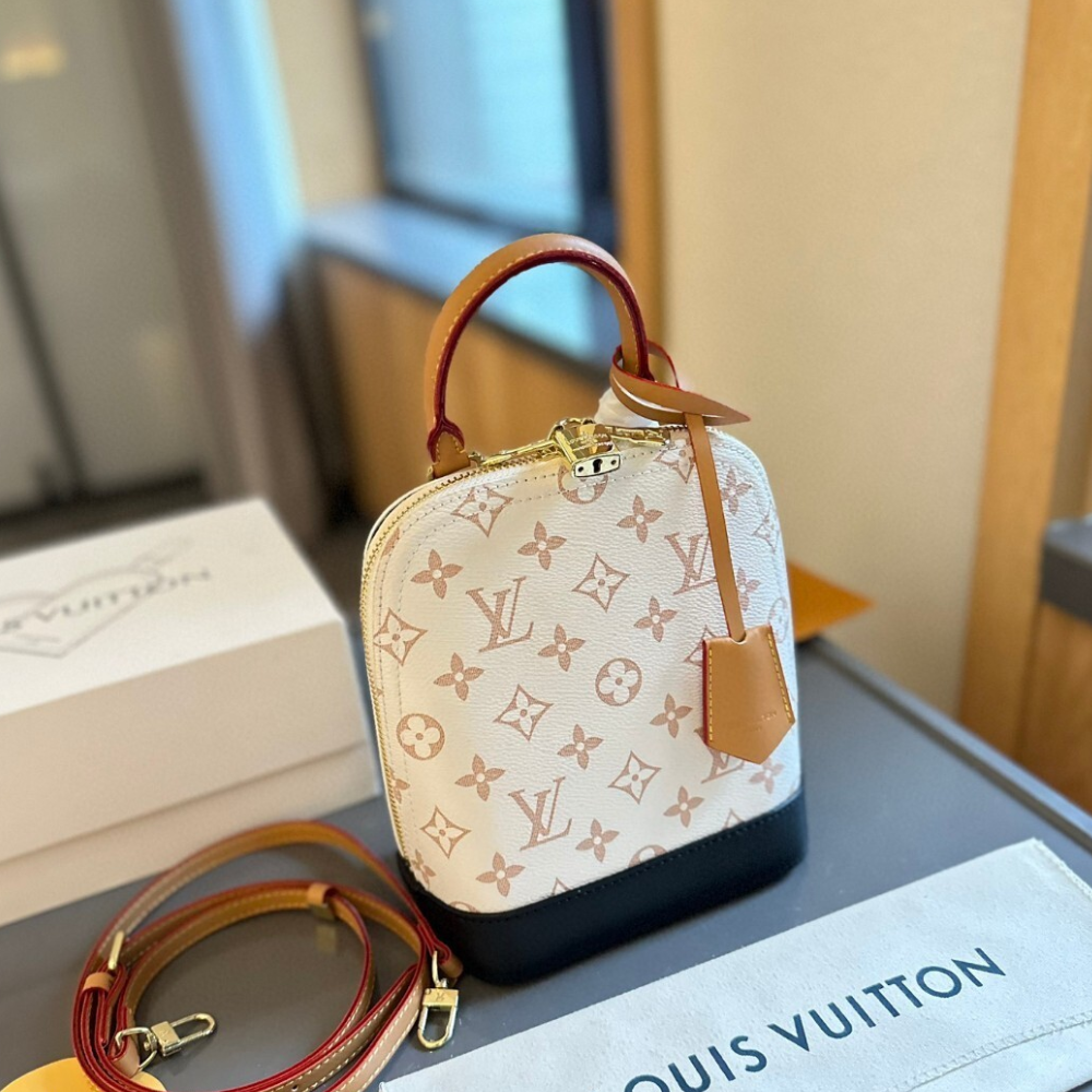 Louis Vuitton Alma Backpack Monogram Empreinte Bicolor 7.9 Inches M47132