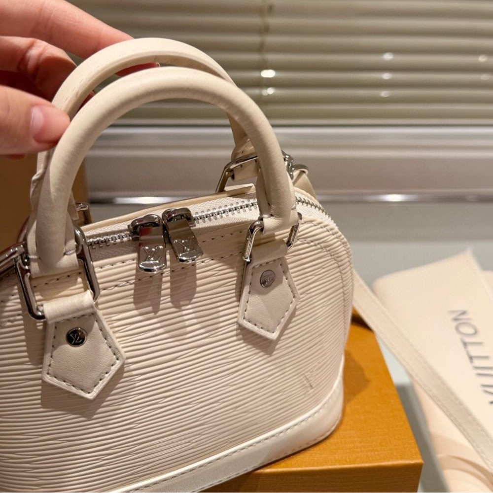 Louis Vuitton Nano Alma Epi Noir Beige 7.1 Inches M81945