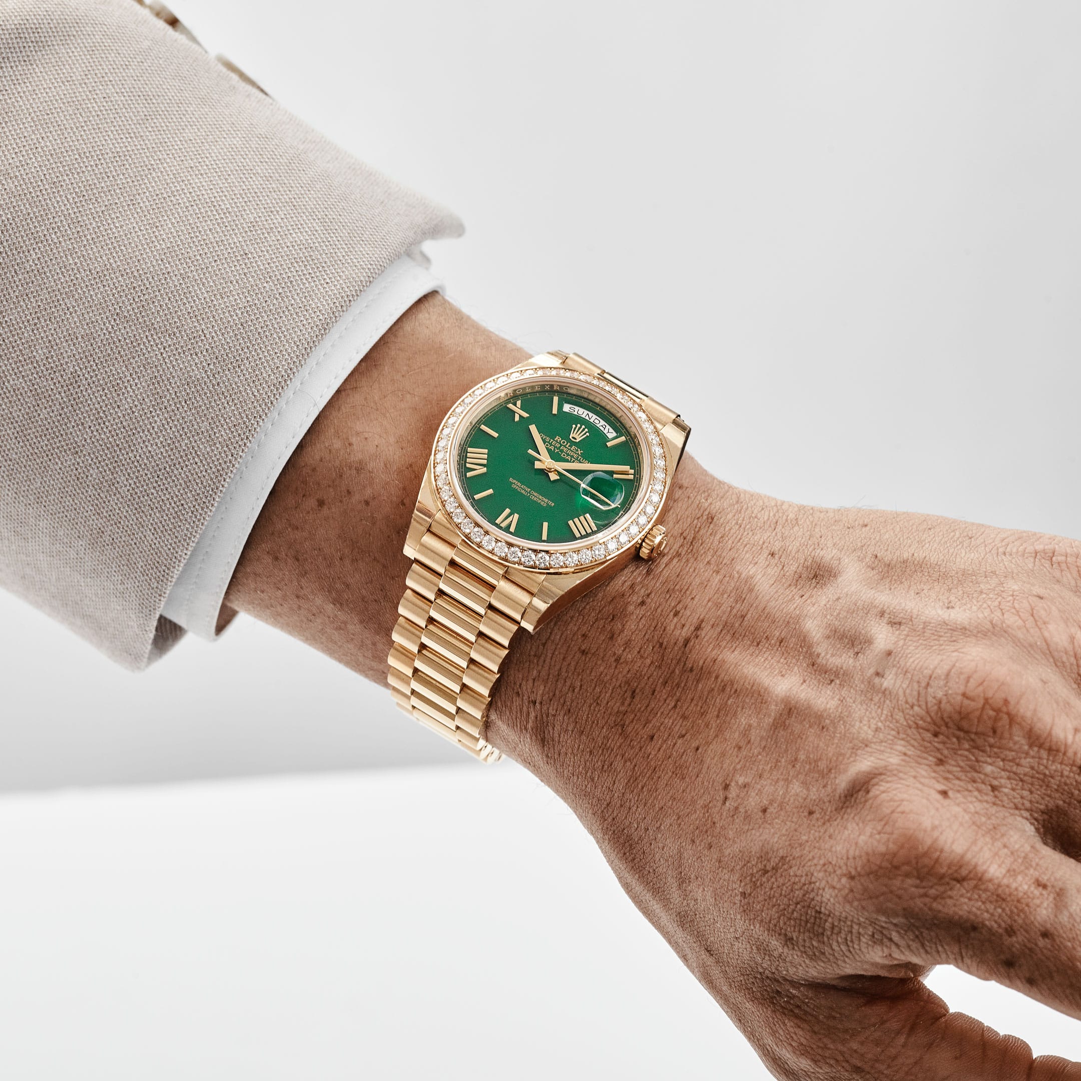 Rolex Day-Date 40 228348RBR Yellow Gold Green Roman Numeral Dial Diamond Bezel (2022)