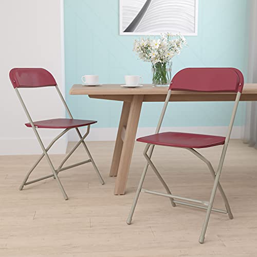 EMMA + OLIVER Set of 2 Plastic Folding Chairs - 650 LB Weight Capacity Lightweight Stackable Folding Chair in White