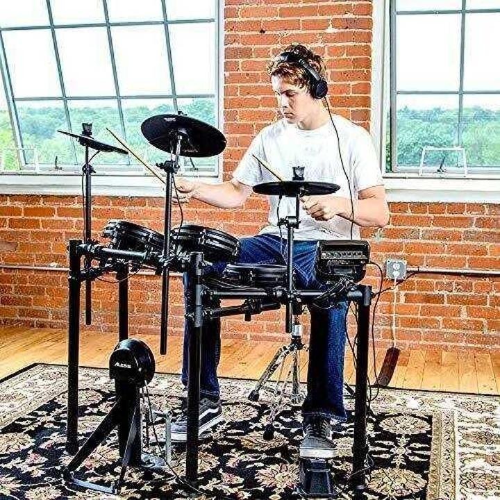alesis-drums-nitro-mesh-kit-Eight Piece All Mesh Electronic Drum Kit With Super Solid Aluminum Rack, 385 Sounds, 60 Play Along Tracks, Connection Cables, Drum Sticks & Drum Key Included