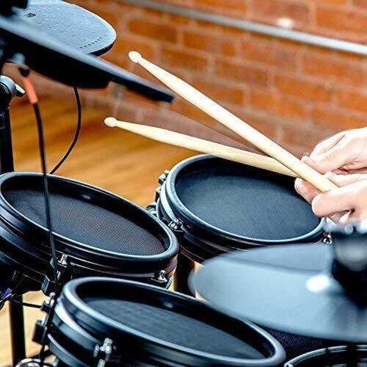 alesis-drums-nitro-mesh-kit-Eight Piece All Mesh Electronic Drum Kit With Super Solid Aluminum Rack, 385 Sounds, 60 Play Along Tracks, Connection Cables, Drum Sticks & Drum Key Included