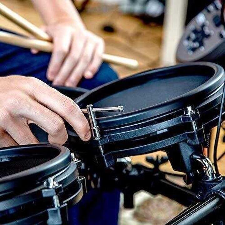 alesis-drums-nitro-mesh-kit-Eight Piece All Mesh Electronic Drum Kit With Super Solid Aluminum Rack, 385 Sounds, 60 Play Along Tracks, Connection Cables, Drum Sticks & Drum Key Included