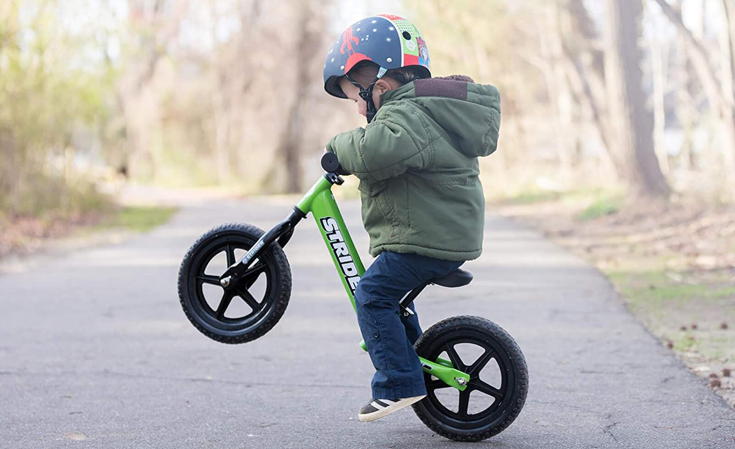 Strider - 12 Sport Kids Balance Bike�� No Pedal Training Bicycle�� Lightweight Frame�� Flat-Free Tires�� For Toddlers and Children Ages 18 Months to 5 Years Old (Green)