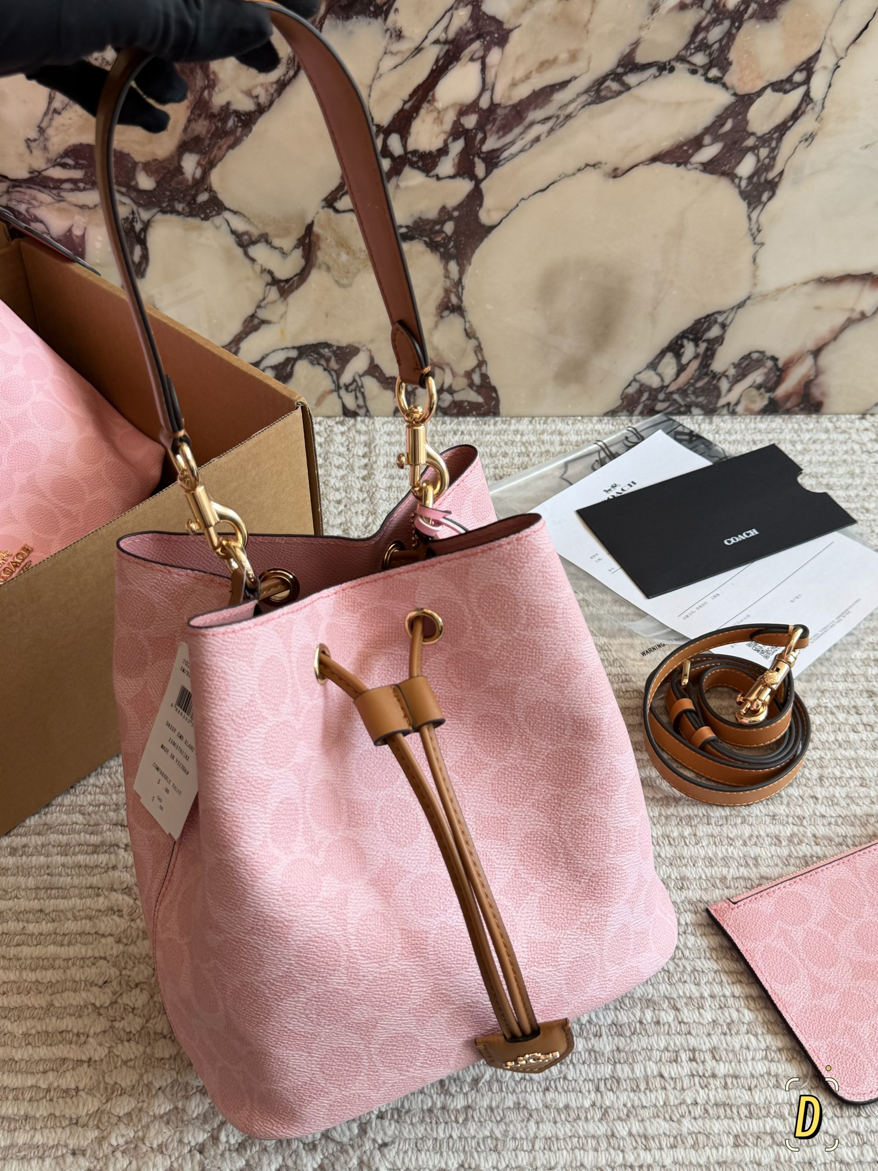 Coach's new bucket bag - cnluxepick
