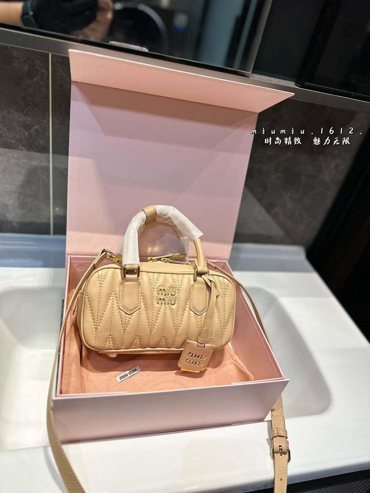 Miumiu Aracdie pleated bowling bag - cnluxepick