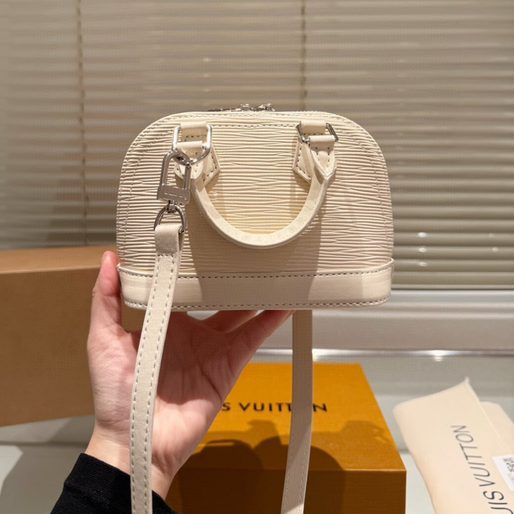 Louis Vuitton Nano Alma Epi Noir Beige 7.1 Inches M81945