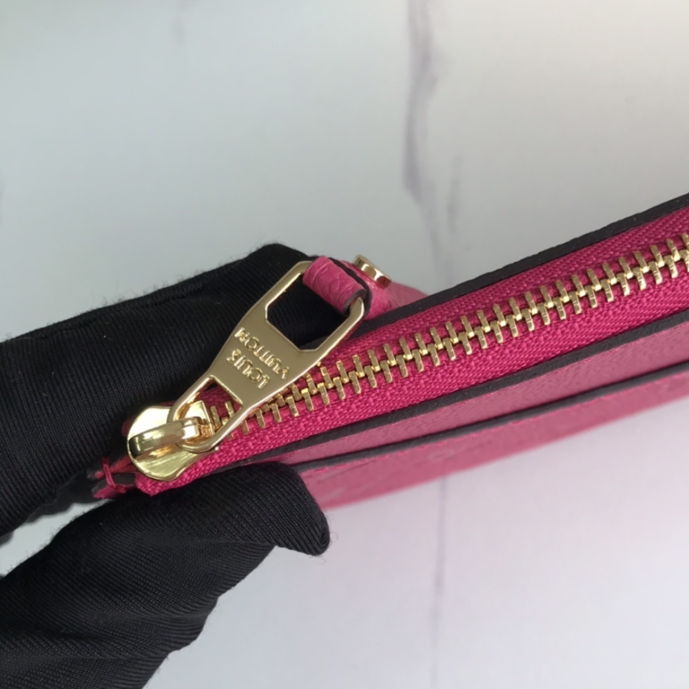 Louis Vuitton Pochette Melanie Monogram Empreinte Fuchsia 9 Inches M68712