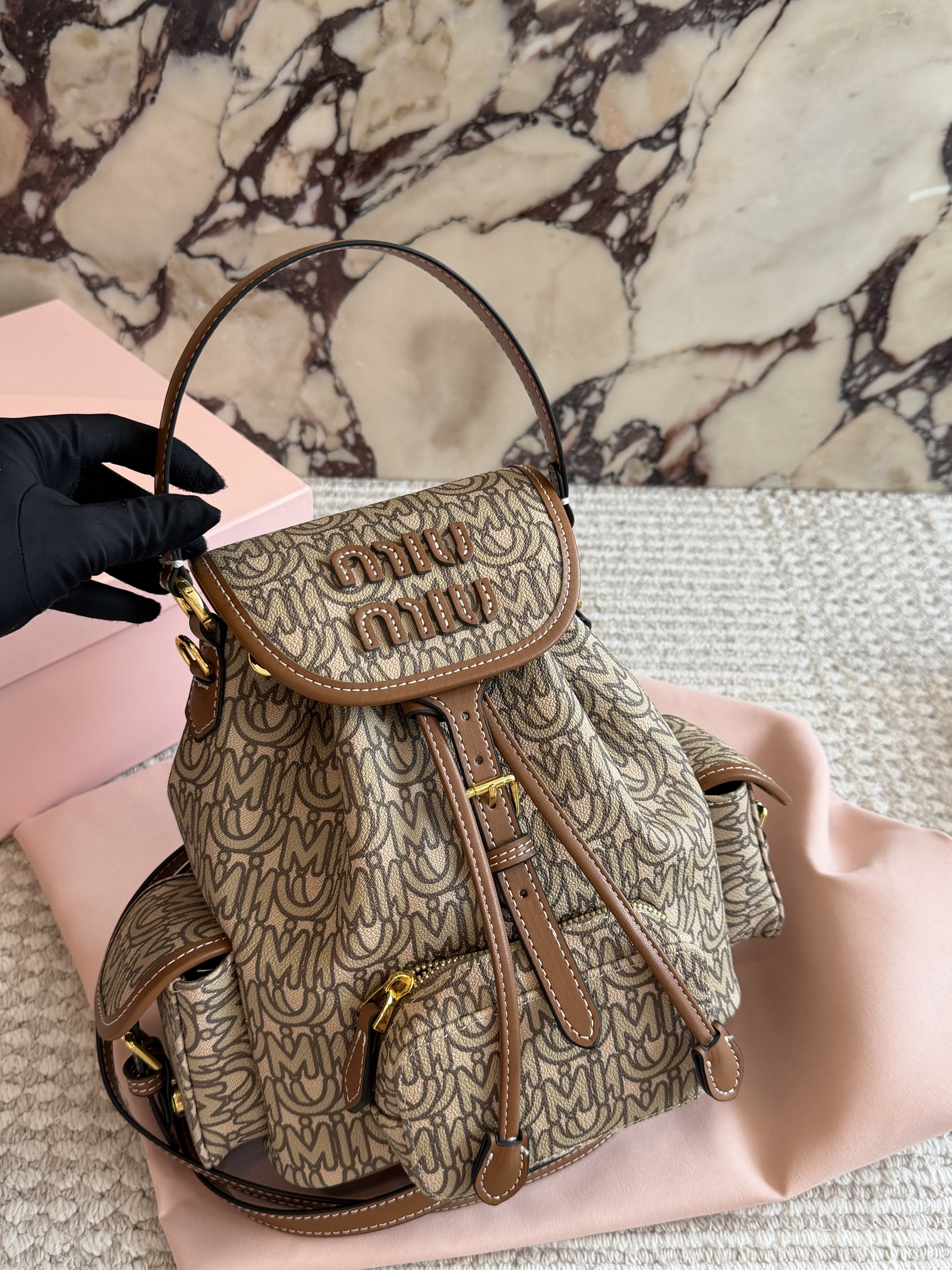 Miu Miu Stylish and Practical Backpacks - cnluxepick