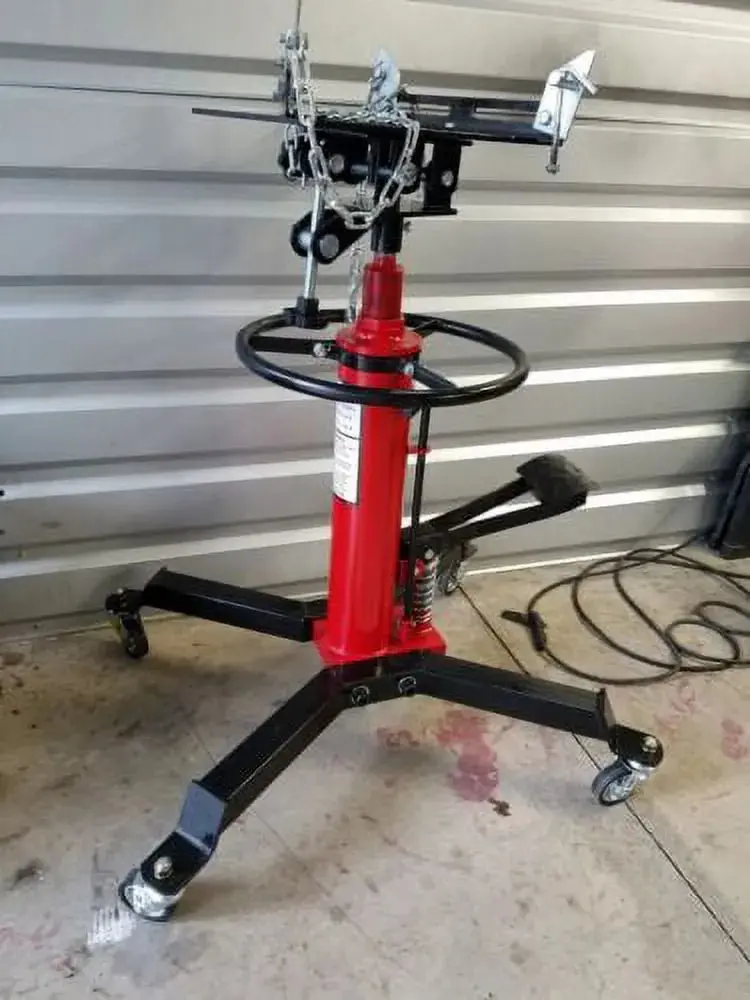 Red 1660-lb Hydraulic Transmission Jack – Vertical Lift with 360° Rotating Wheels and 33″–70″ Height Range