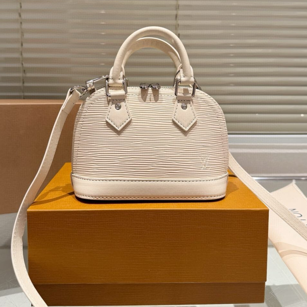 Louis Vuitton Nano Alma Epi Noir Beige 7.1 Inches M81945