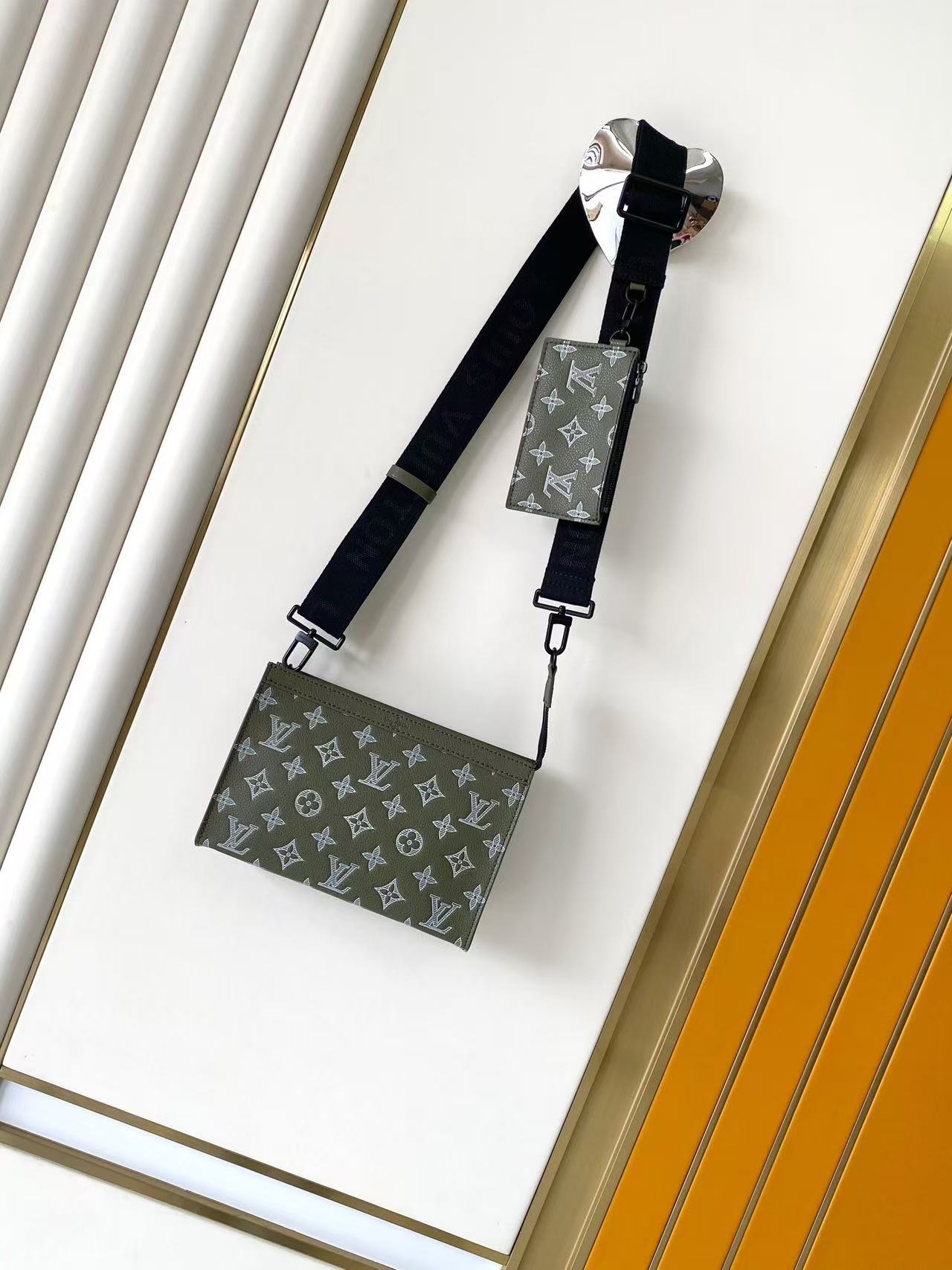 LV Pochette Voyage Dark Green M13197