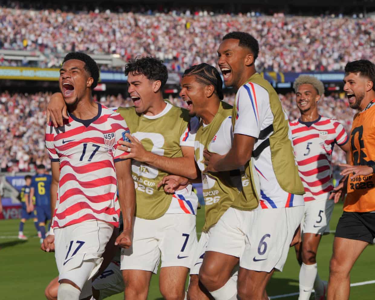 Resilient USA down Bosnia and Herzegovina 2-0 despite controversial Balogun red card to reach first World Cup knockouts in 24 years