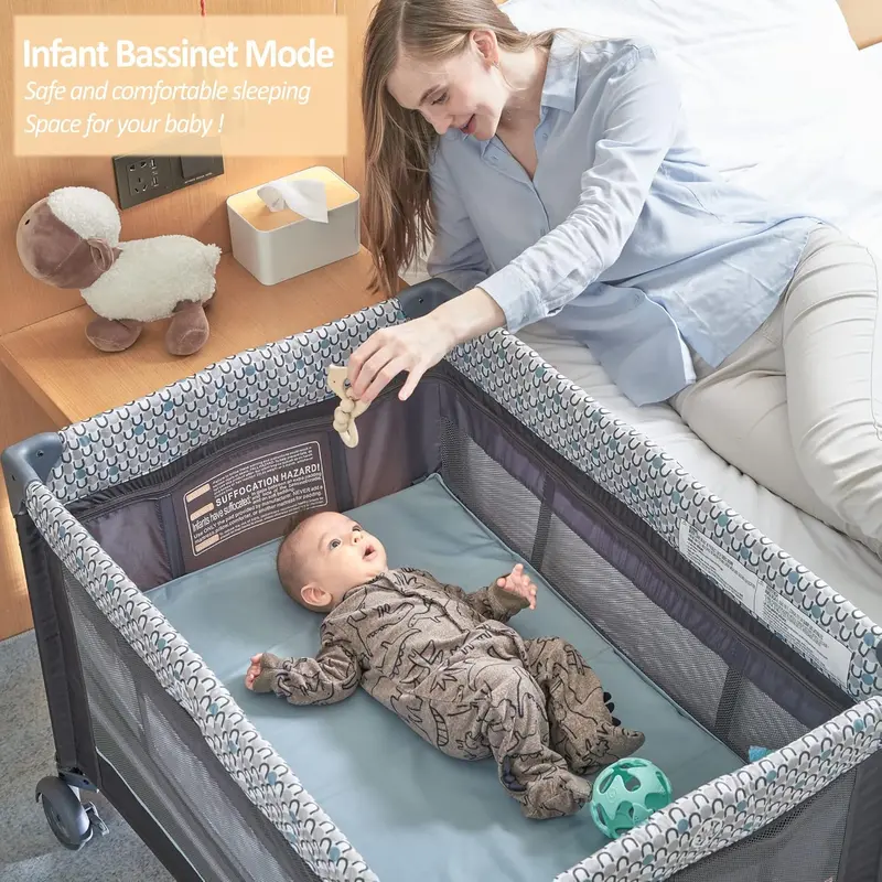 QUTANIX 5-in-1 Multifunctional Pack ‘n Play — Includes Bassinet & Travel Features