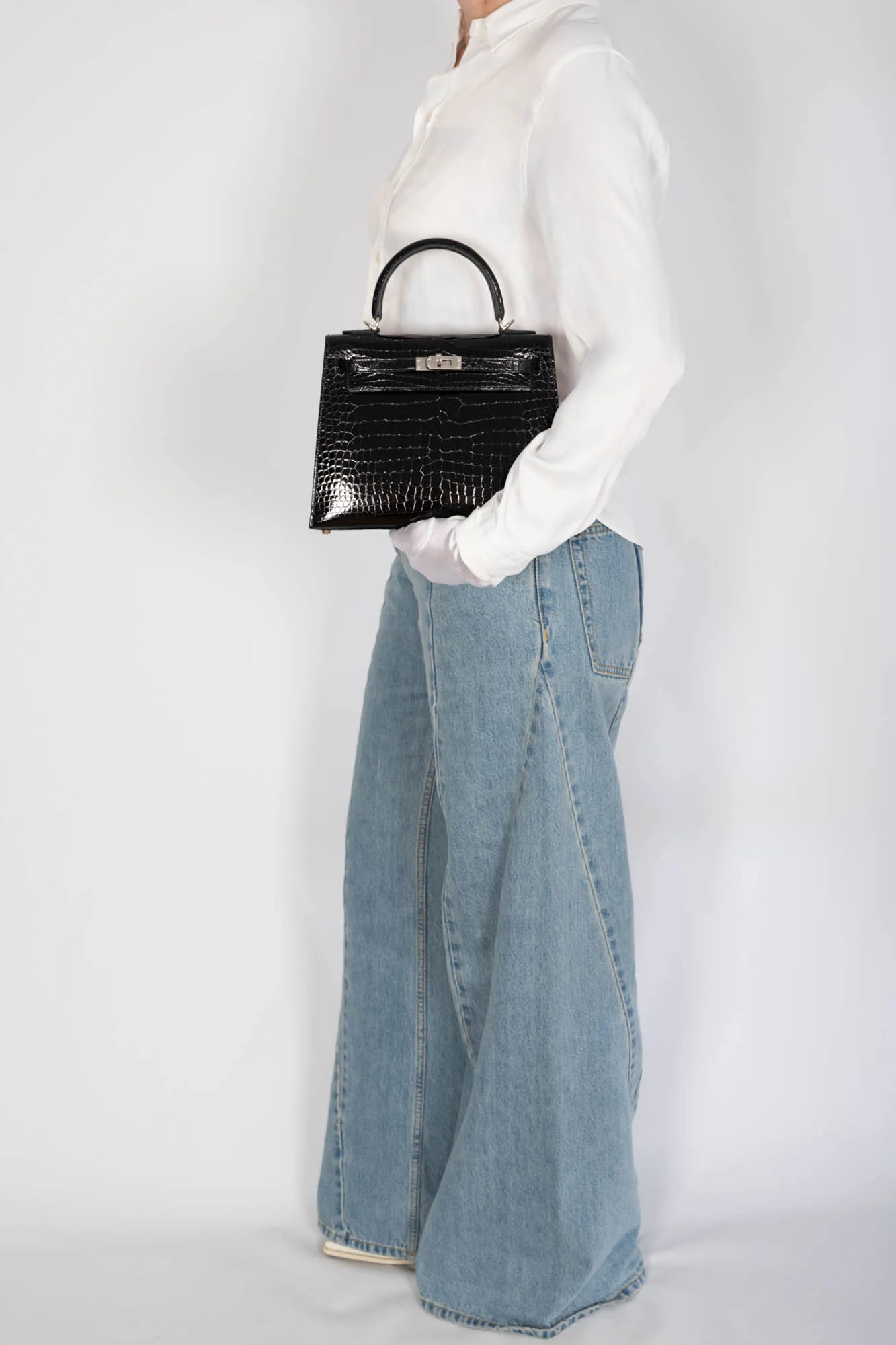 Hermès Kelly 25 Sellier Noir Shiny Porosus Crocodile Palladium Hardware