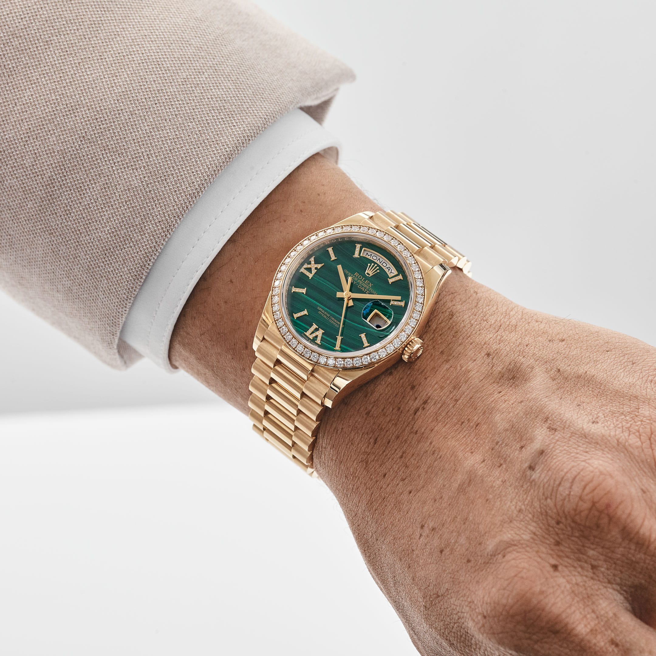Rolex Day-Date 36 128348RBR Yellow Gold Green Malachite Diamond Roman Numerals Dial Diamond Bezel (2021)