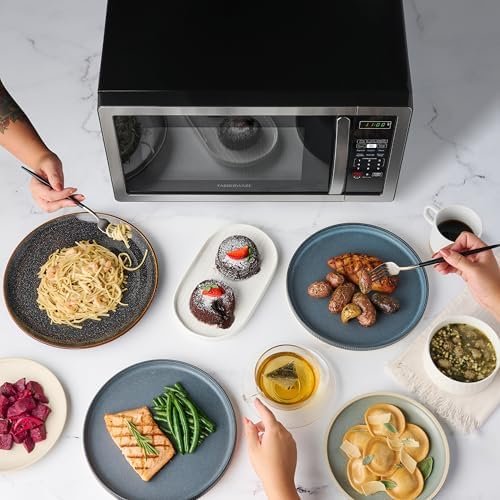 1.1 Cu. Ft. Countertop Microwave Oven – 1000 Watts Power, Auto Cook Settings, Defrost, Easy Clean and Child Safety Lock – Stainless