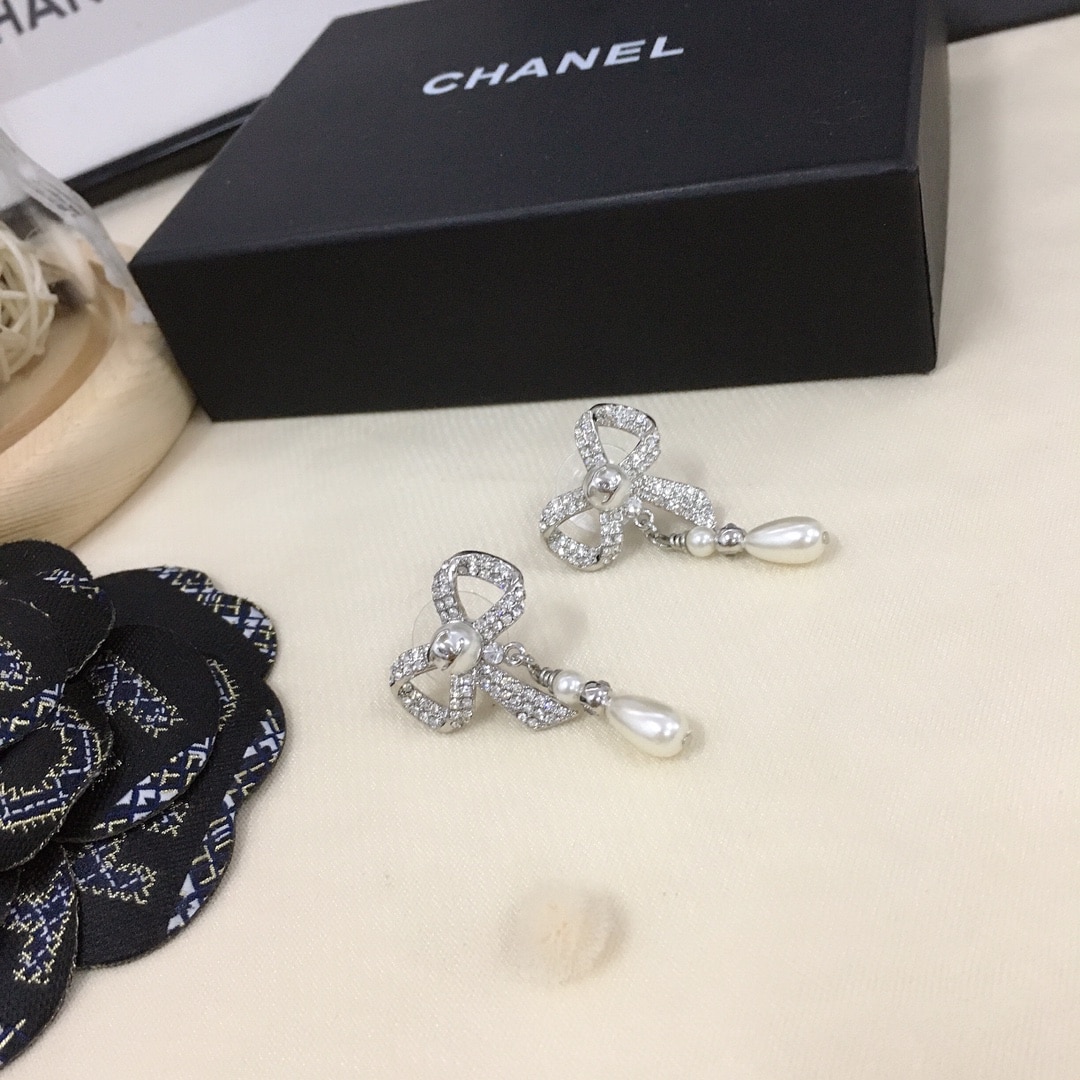 Chanel Bow Silver Pearl Earrings