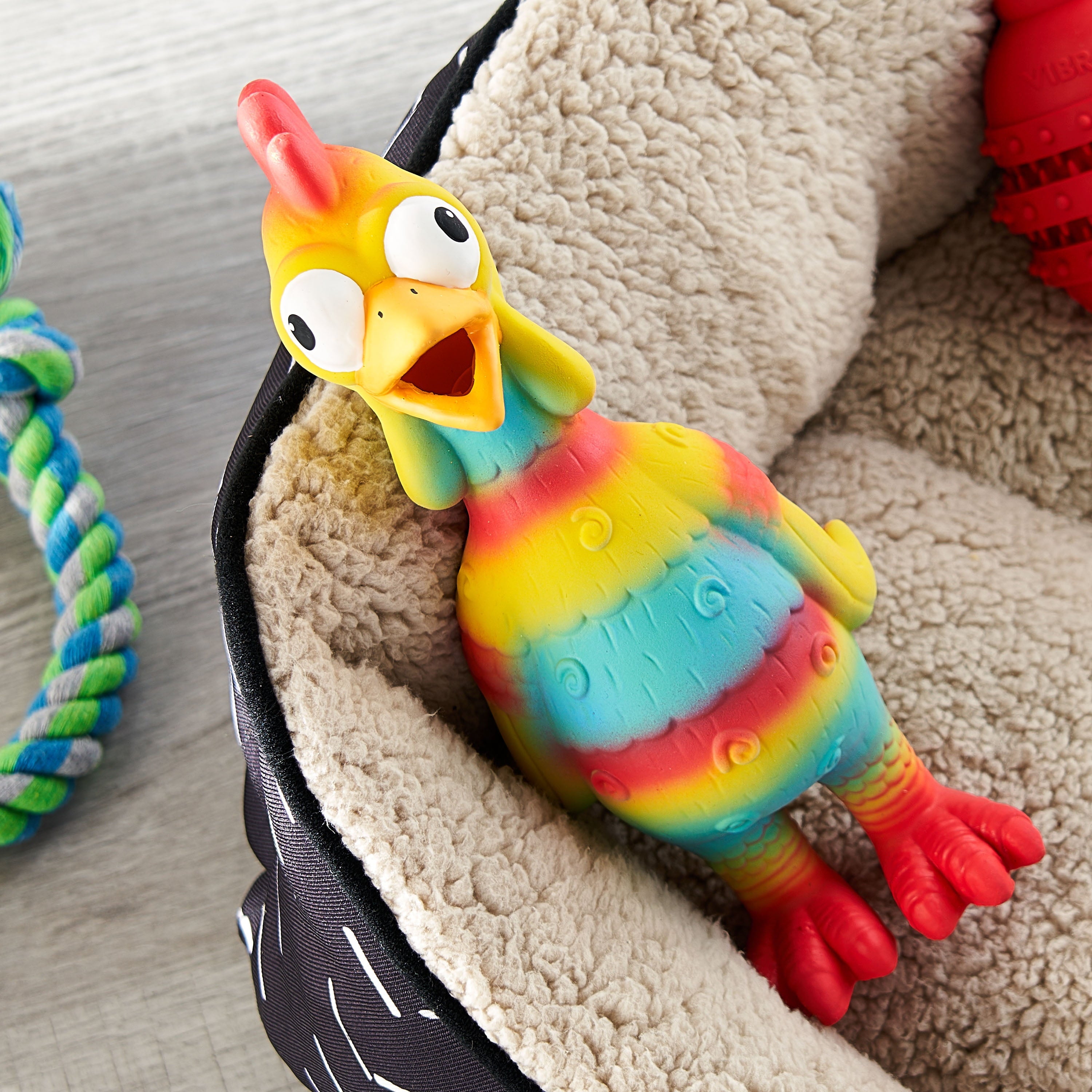 Vibrant Life Playful Buddy Tie Dye Chicken Dog Toy, Chew Level 2, with Squeaker.