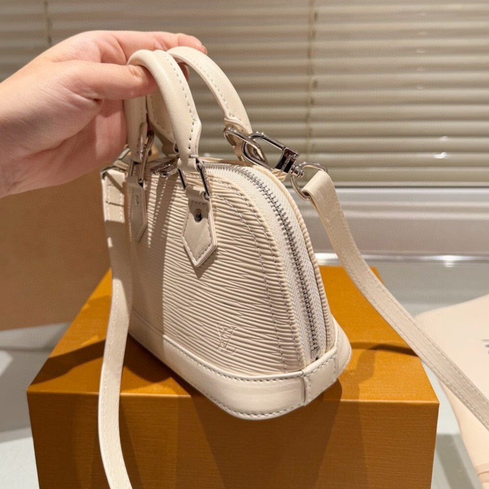 Louis Vuitton Nano Alma Epi Noir Beige 7.1 Inches M81945