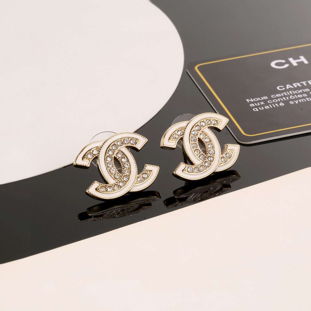 Chanel's classic Double C stud earrings - cnluxepick