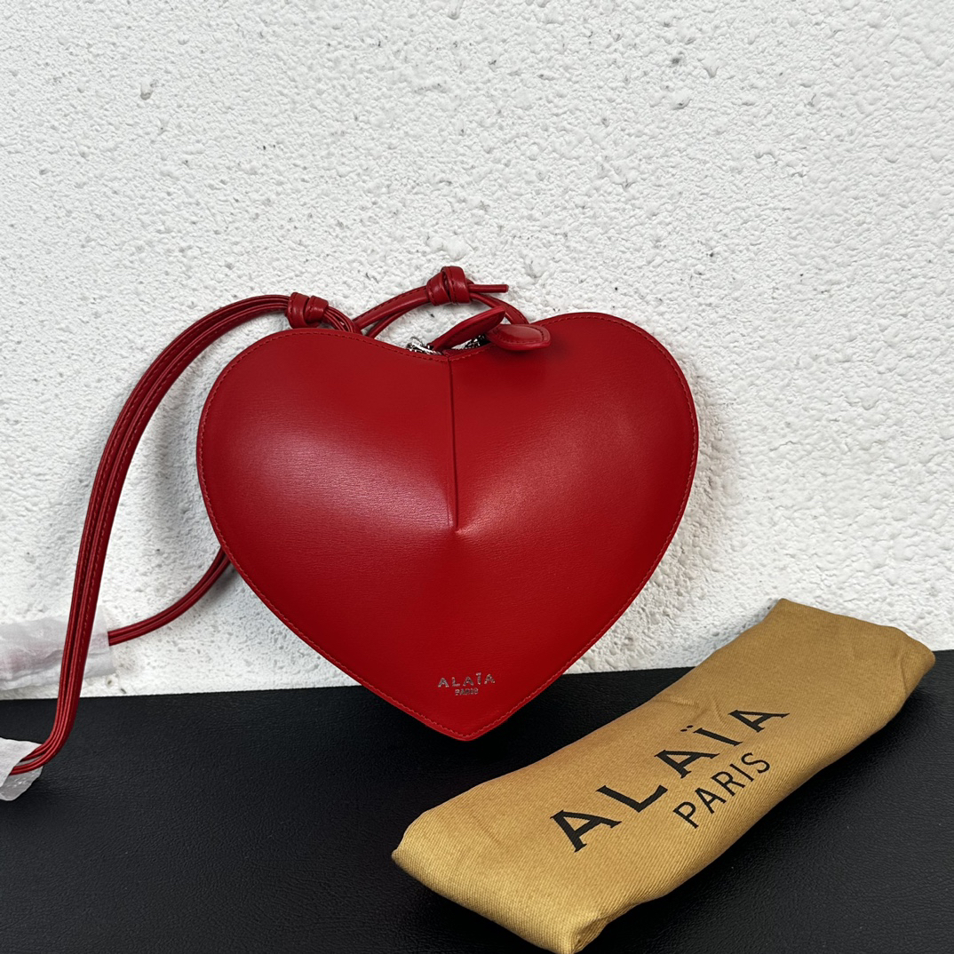 ALAIA Le Coeur heart-shaped leather cross-body bag - cnluxepick