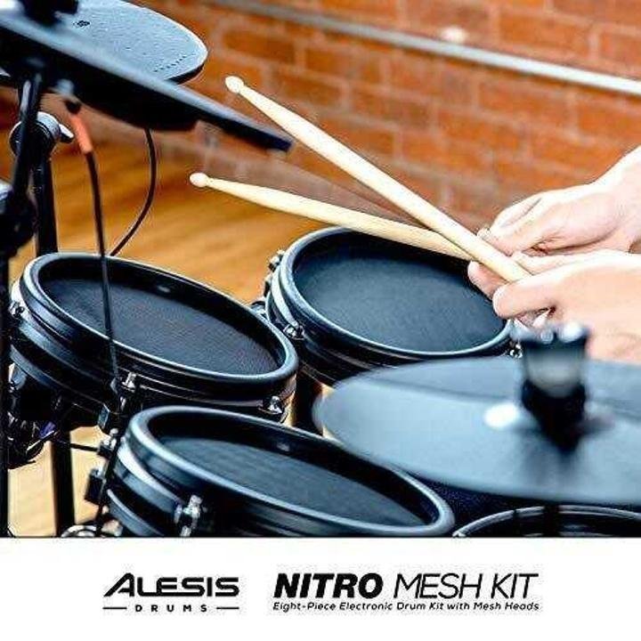 alesis-drums-nitro-mesh-kit-Eight Piece All Mesh Electronic Drum Kit With Super Solid Aluminum Rack, 385 Sounds, 60 Play Along Tracks, Connection Cables, Drum Sticks & Drum Key Included