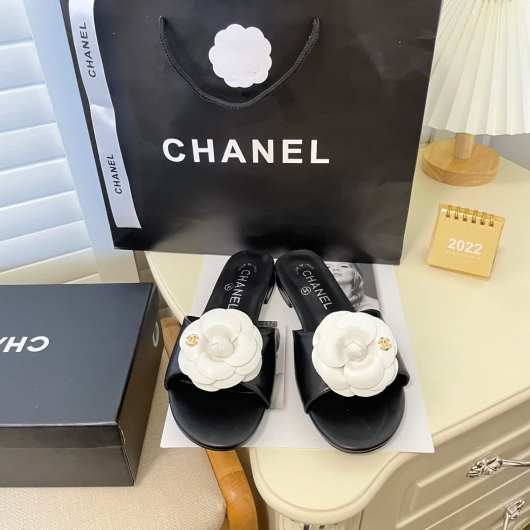 Chanel White Camellia Slides Black