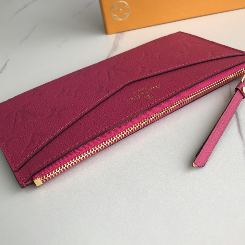 Louis Vuitton Pochette Melanie Monogram Empreinte Fuchsia 9 Inches M68712