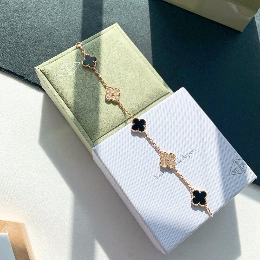 Van Cleef & Arpels yellow gold and black onyx diamond flower bracelet - cnluxepick