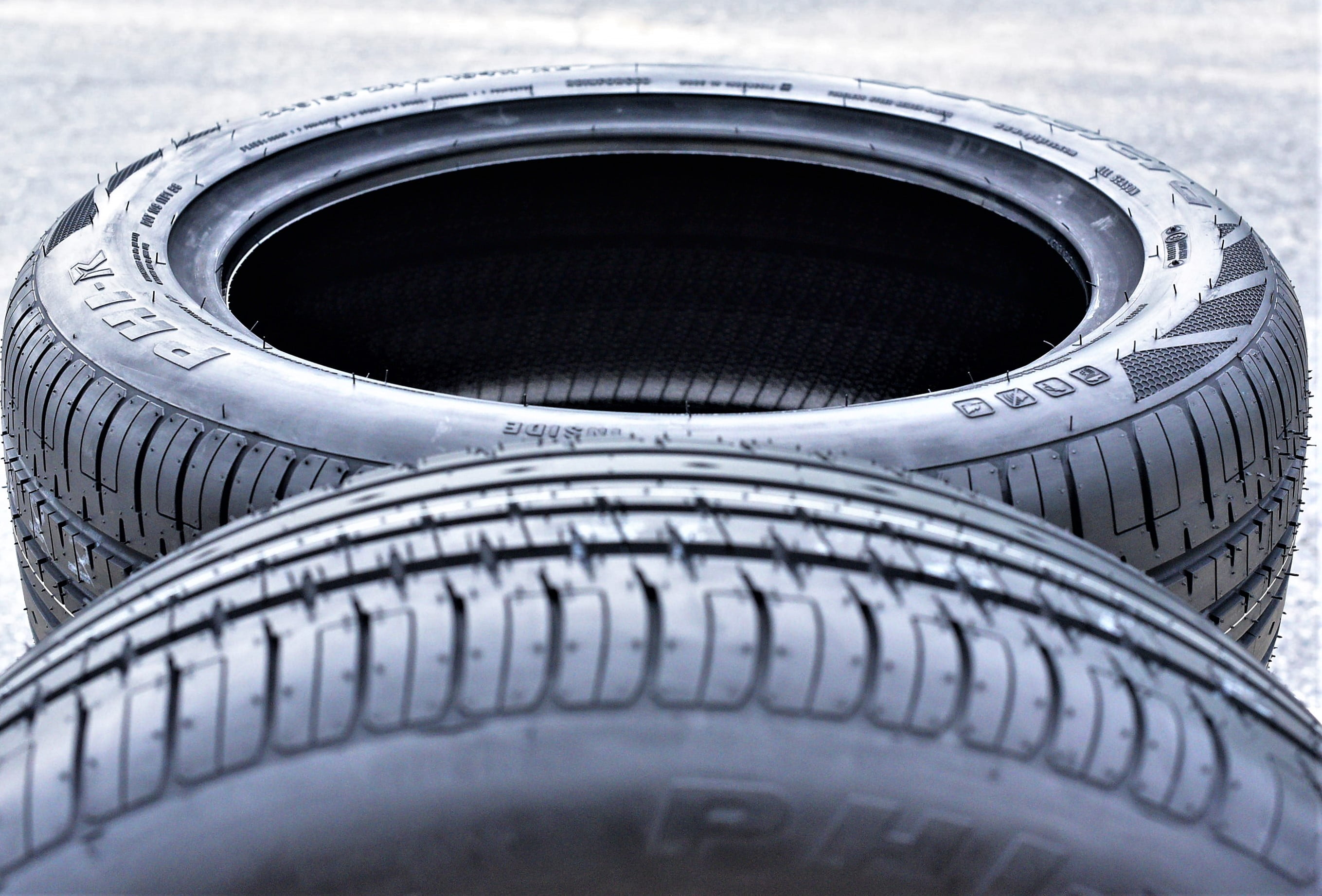 A pair of 2(2) 225/40R20 101W XL AS A/S performance tires