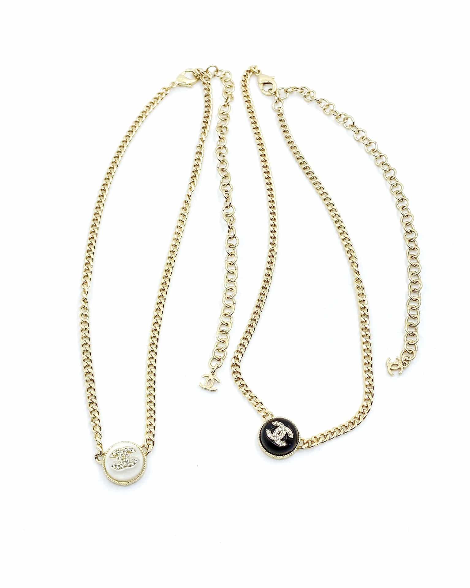 Chanel Logo Cc Necklace In Gold Metal And Silver Resin