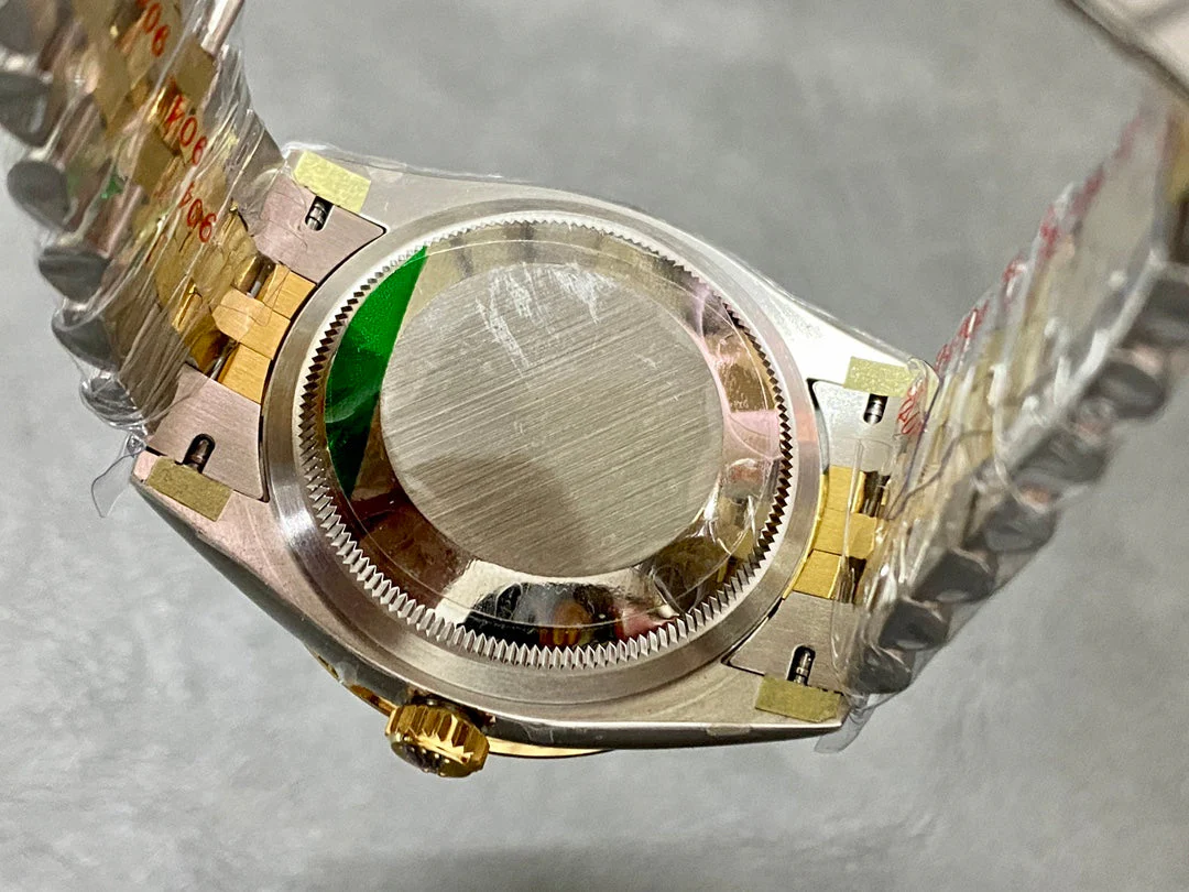 DATEJUST 31MM GOLD STEEL DIAMOND BEZEL GREEN DIAL