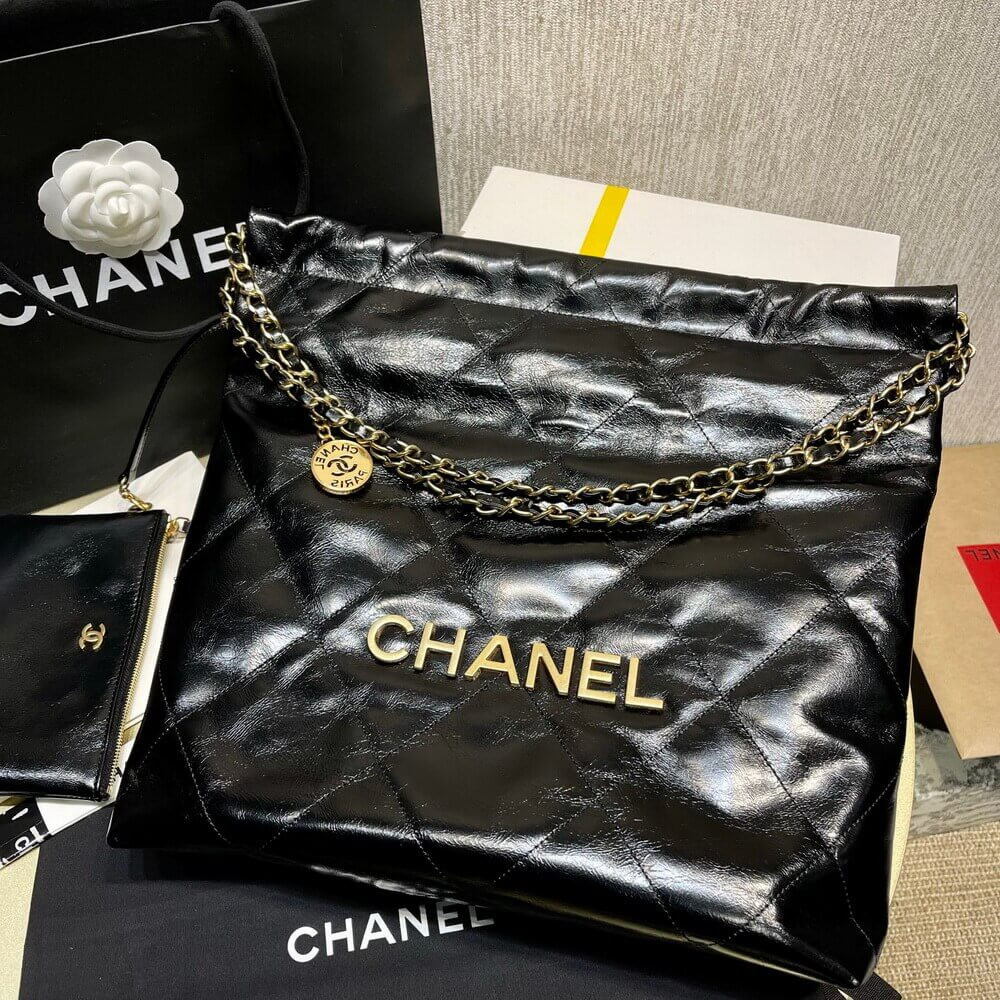 Chanel 22 Small Handbag Shiny Calfskin Black Gold