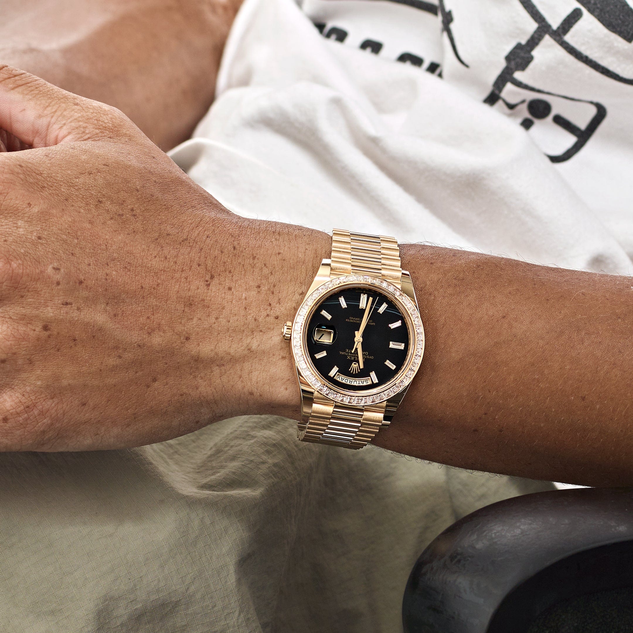 Rolex Day-Date 40 228398TBR Yellow Gold Onyx Baguette Diamond Dial Baguette Bezel