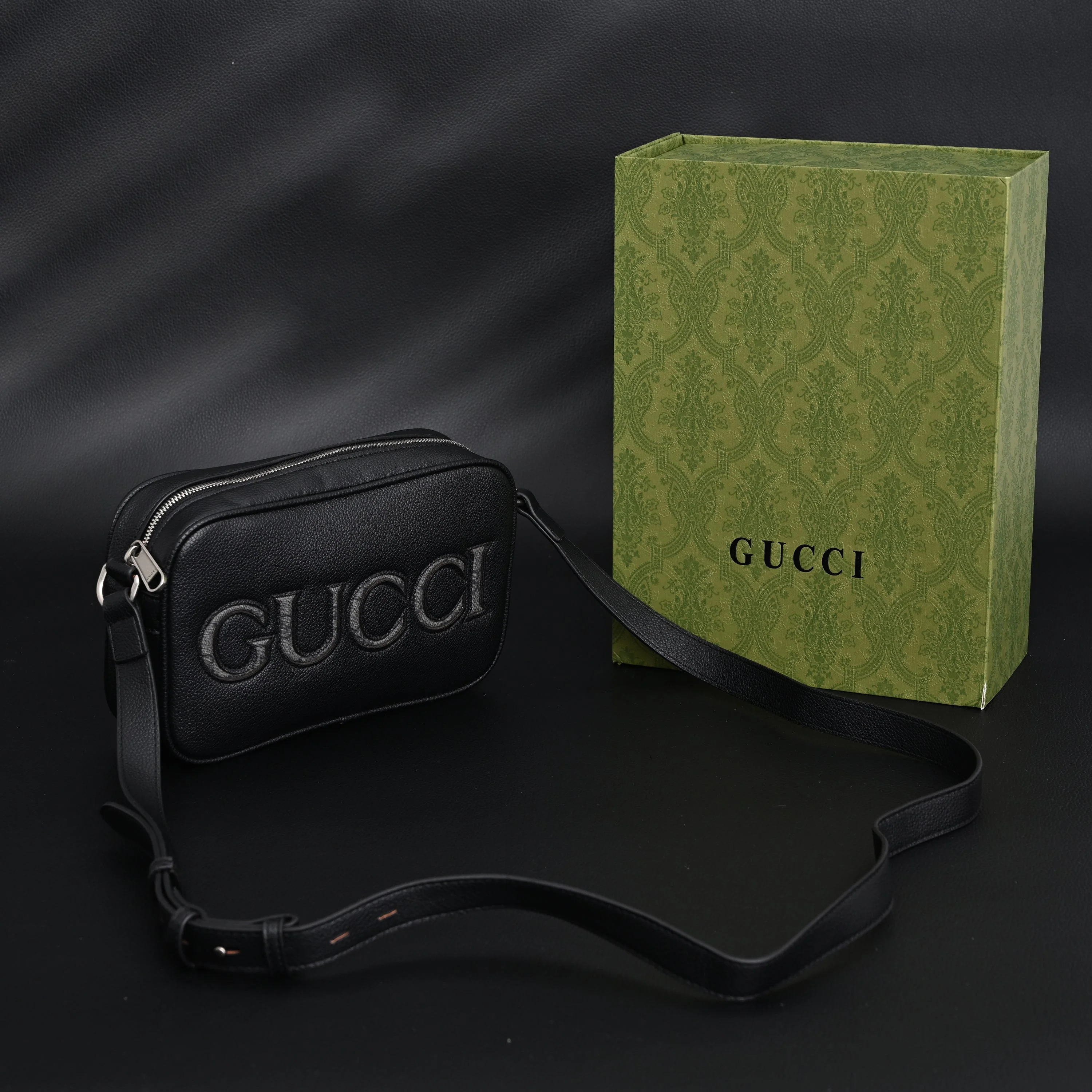 Gucci Black Leather Embossed Logo Belt Bag